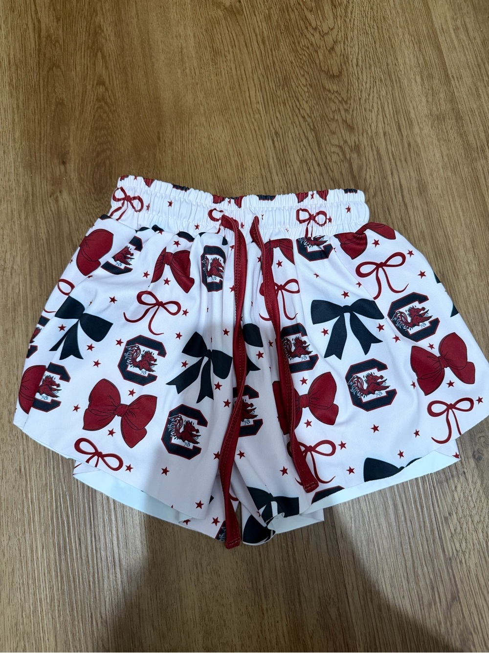 Girls' Gamecock White Shorts with Red & Black Bow Print